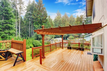 What causes dirt buildup on decks
